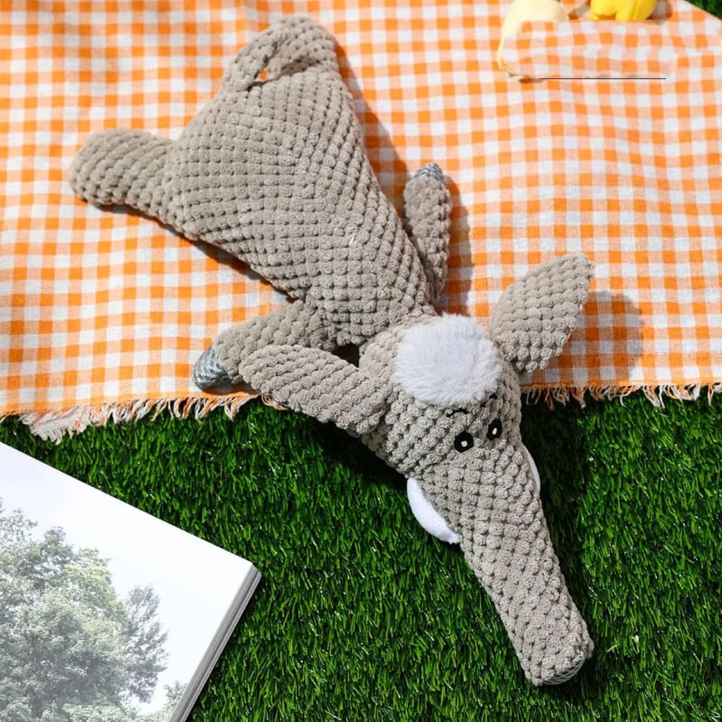Corn kernel design plush dog chewing toy with animal shape and built-in squeaker in green, grey or yellow colours