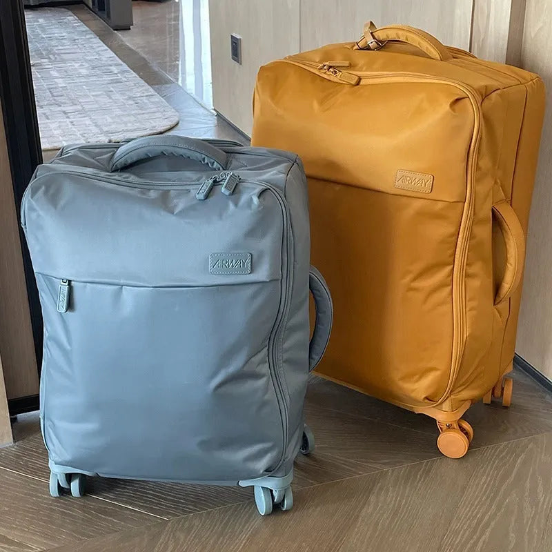 20-inch waterproof Oxford cloth suitcase in bluestone green with universal wheels