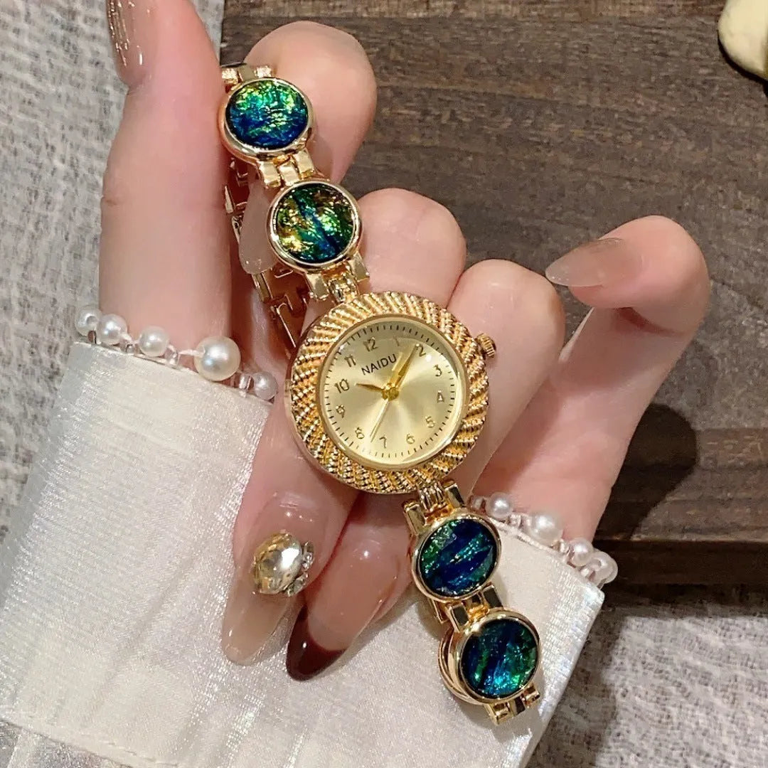Women's quartz wristwatch with 25mm round dial and spiral crown in various colours