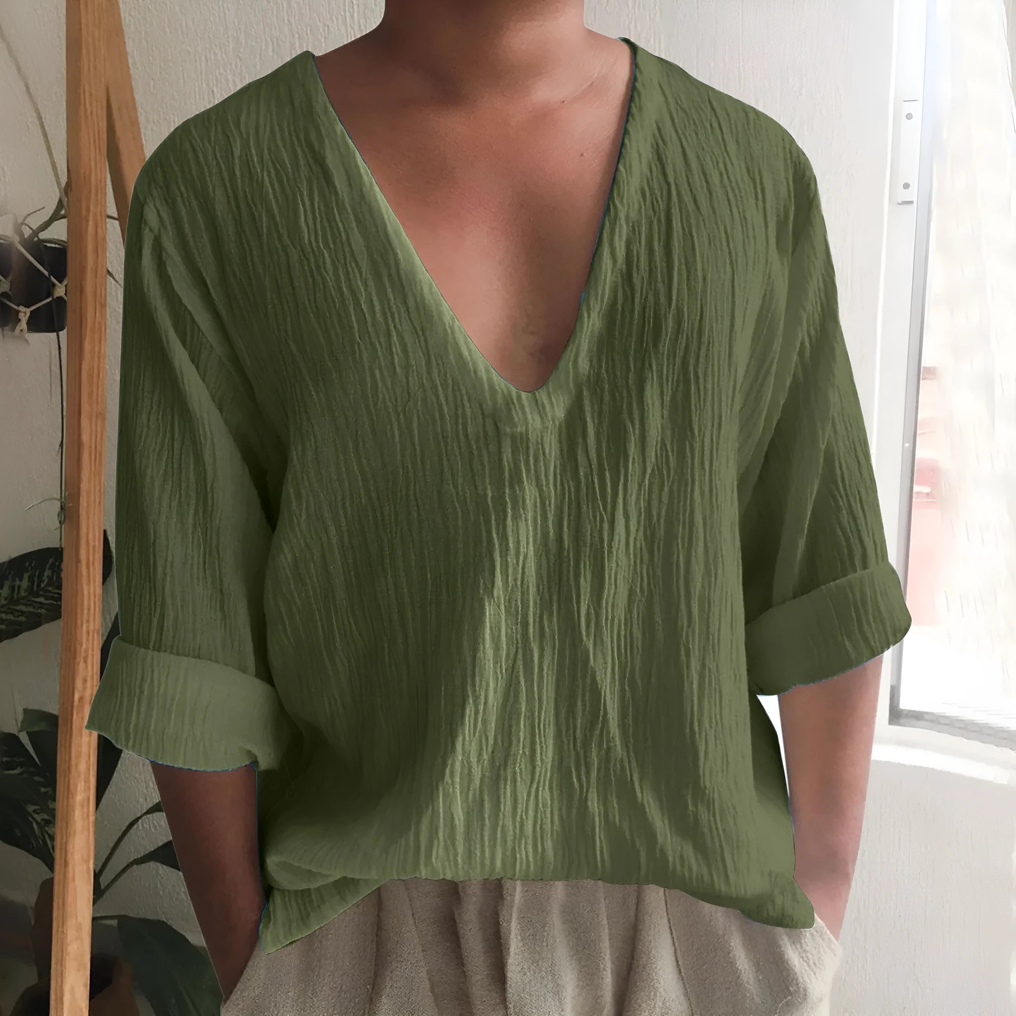 Men's solid colour long sleeve V-neck t-shirt in washed cotton linen fabric.