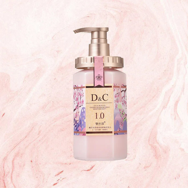 Sakura Wash Set showing 500ml shampoo, conditioner, and shower gel bottles with cherry blossom design.