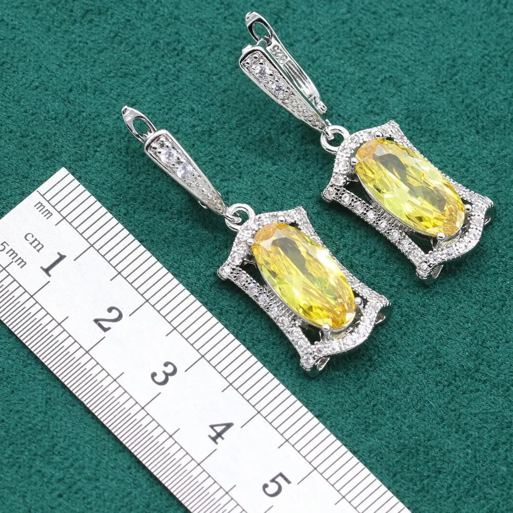 Women's zircon dinner jewellery set with necklace, bracelet, earrings, and ring in yellow or olive green colours