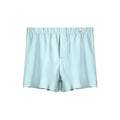 Men's loose-fitting cotton boxer shorts in gold, green, sea blue, and light grey on a mid-waist mannequin.