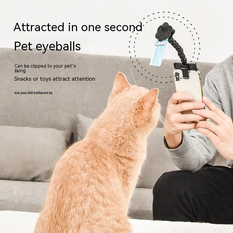 Plastic pet photography mobile phone holder with rotating treat clip in black or white colour