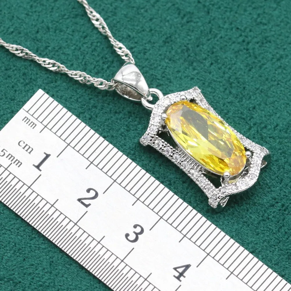 Women's zircon dinner jewellery set with necklace, bracelet, earrings, and ring in yellow or olive green colours