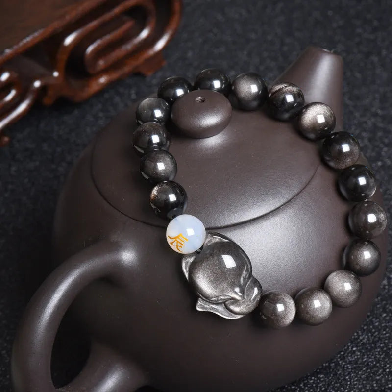 Natural obsidian bracelet with zodiac guardian design and 10mm stone beads