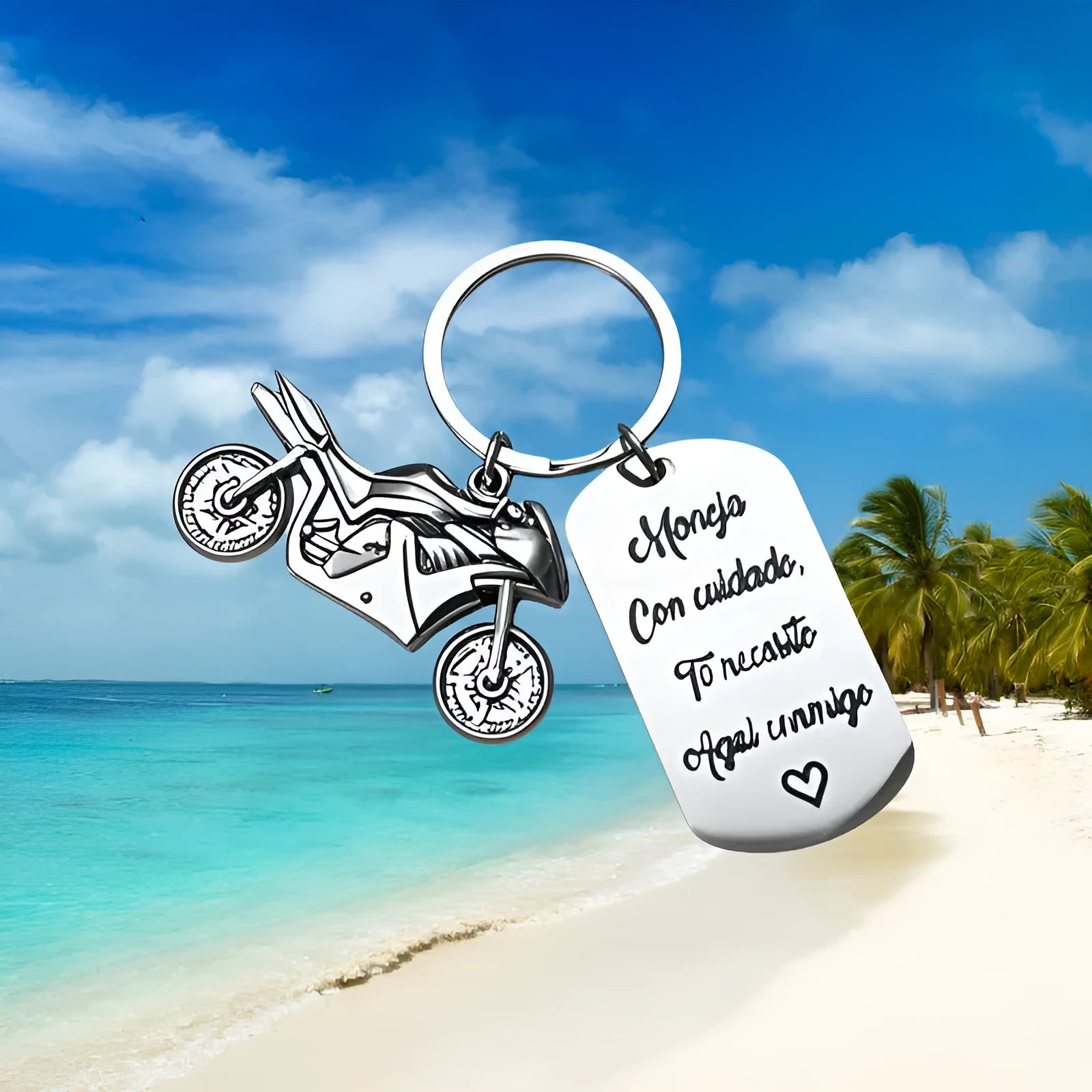 Stainless steel motorcycle keychain with inspirational text and a flannel storage bag.