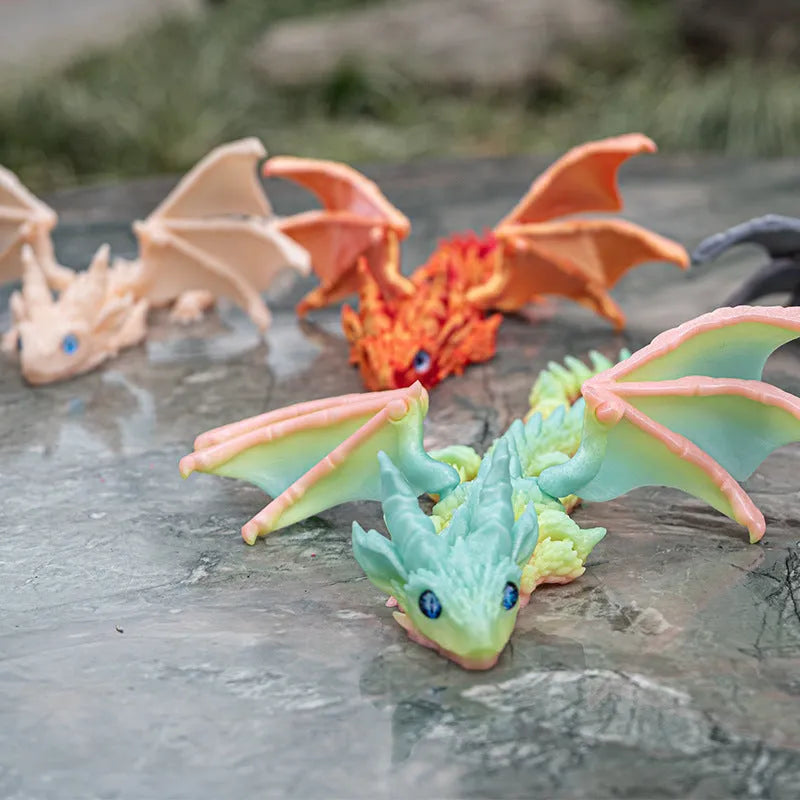 Red and gold printed dragon wings decorative toy made of PLA plastic.