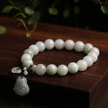 Natural jade bracelet with geometric pendant and hanging charms including Maitreya Buddha, gourd, and double apple designs
