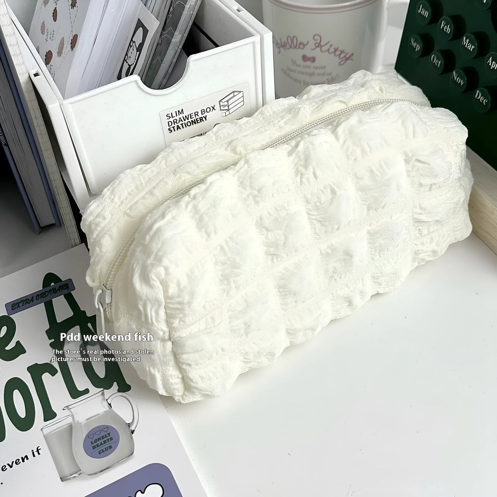 Cream puff design polyester pencil case in beige colour with zippered closure