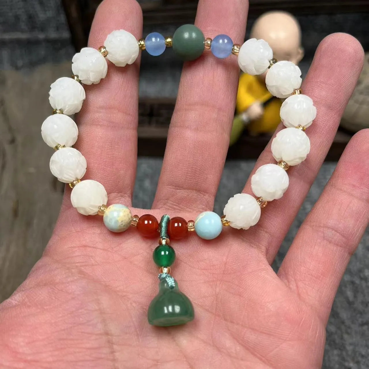 Carved bodhi root pumpkin lotus bracelet with white jade beads and mixed sizing