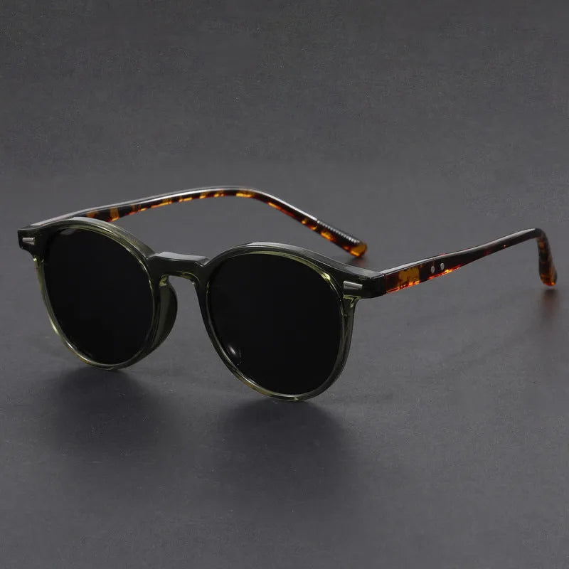 Retro oval frame sunglasses with polarised grey lenses in sand black, bright black, green, grey or dry tea frame colours