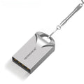 Small black and silver metal USB flash drive showing size comparison