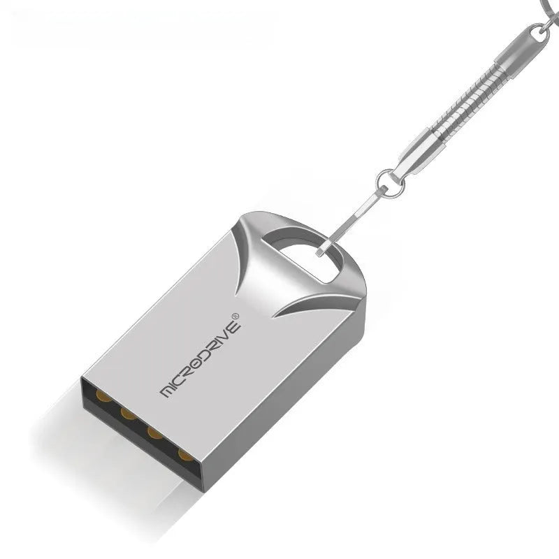 Small black and silver metal USB flash drive showing size comparison