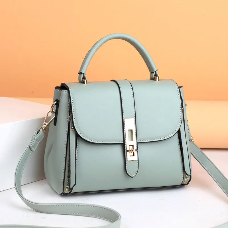 Women's soft leather messenger bag in square vertical design with adjustable shoulder strap