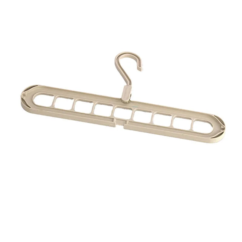 Plastic nine-hole folding trouser hanger in beige, blue, grey, green, or pink colour