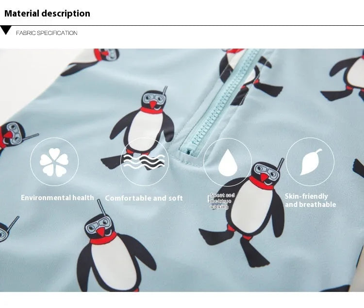 Boy's long sleeve penguin print swimsuit set with matching swimming cap on a white background.