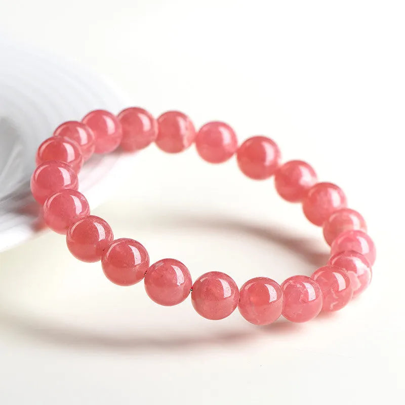 Women's geometric crystal bracelet with longevity lock in natural red rhodochrosite stone patterns