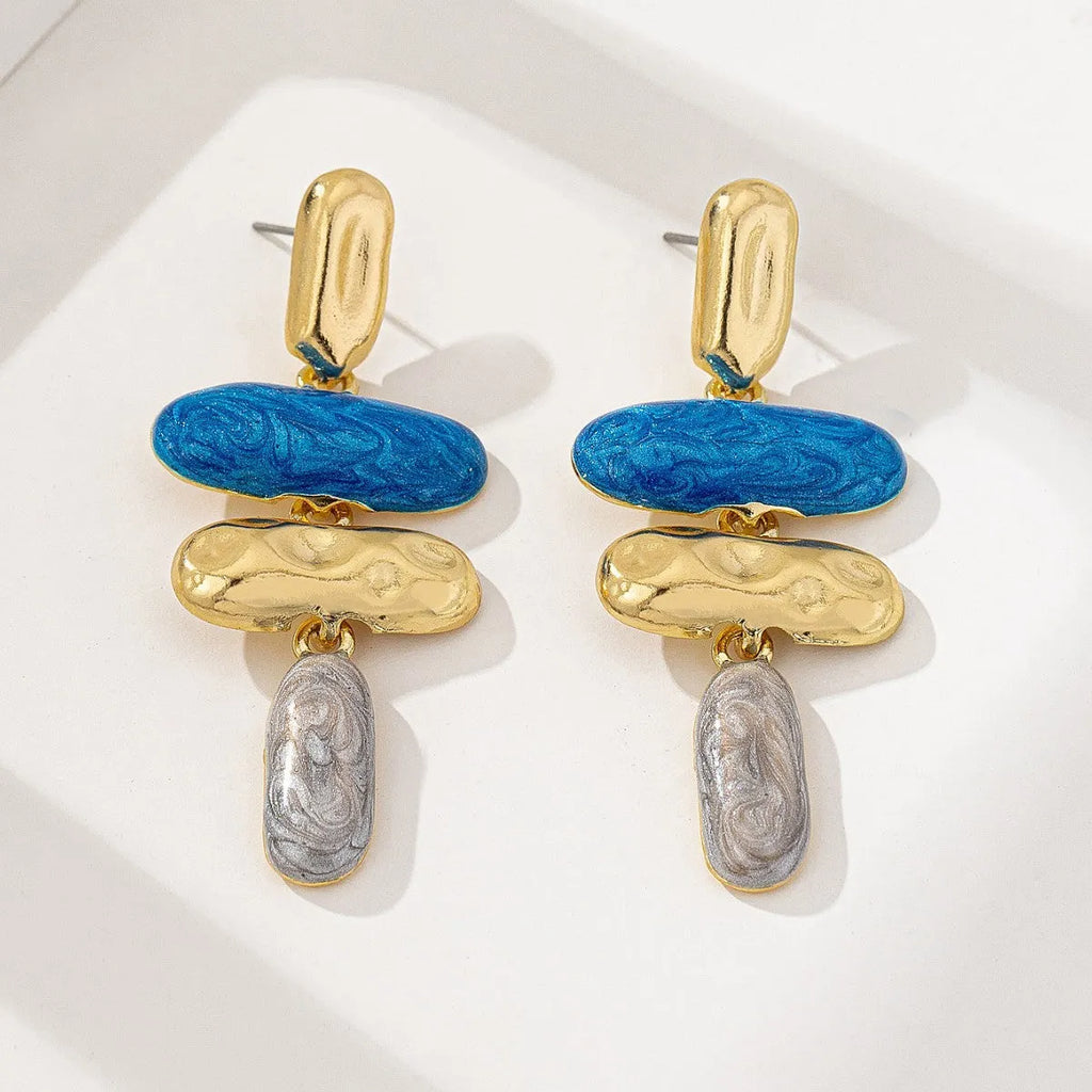 Geometric multicolor stud earrings for women with electroplated finish and simple design.