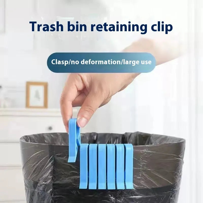 Grey PP plastic non-slip clip for fixing a bin bag to a waste bin rim.