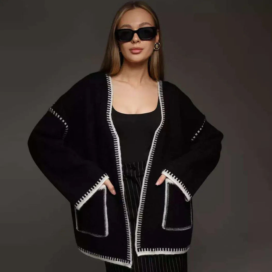 Loose fit knitted cardigan with lace-up front detail in thick imitation cashmere cotton fabric.