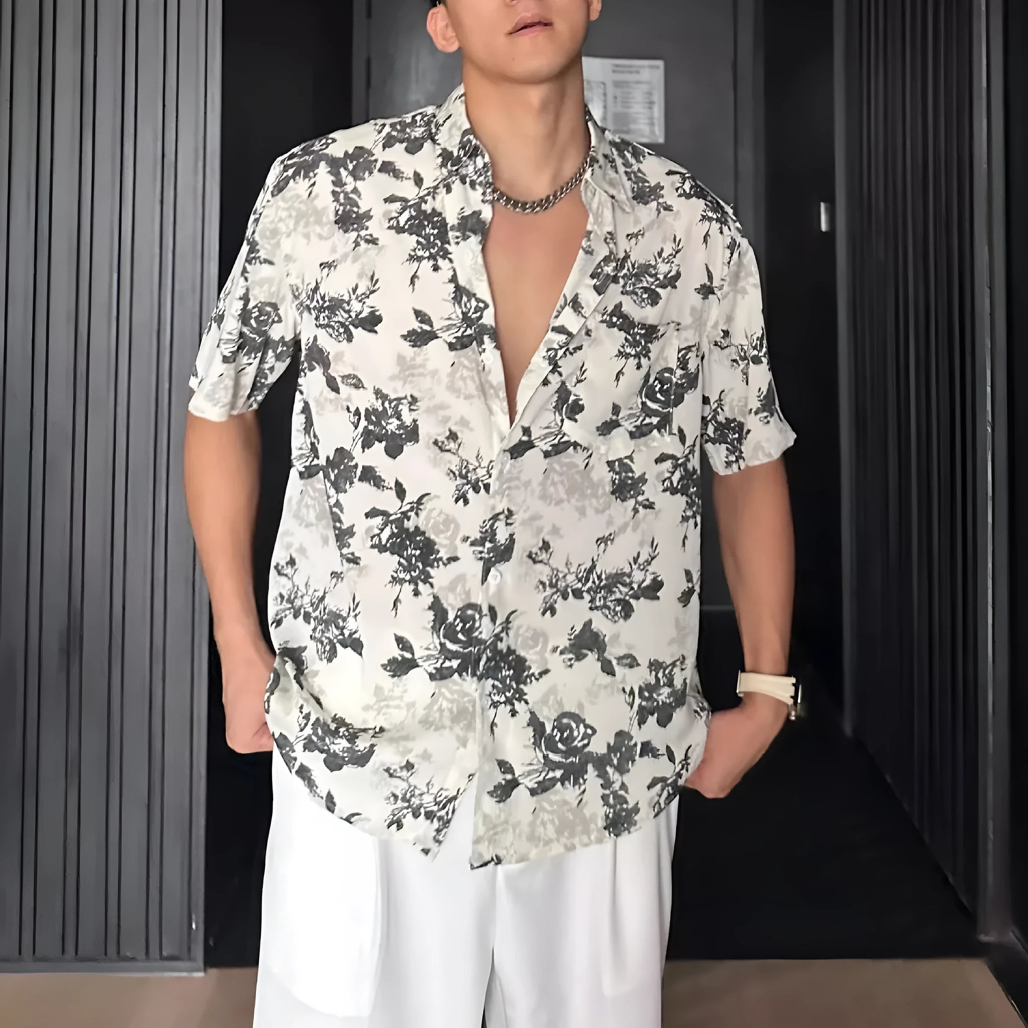 Men's loose-fit printed short sleeve shirt with pendant detail and floral pattern in white or black colours