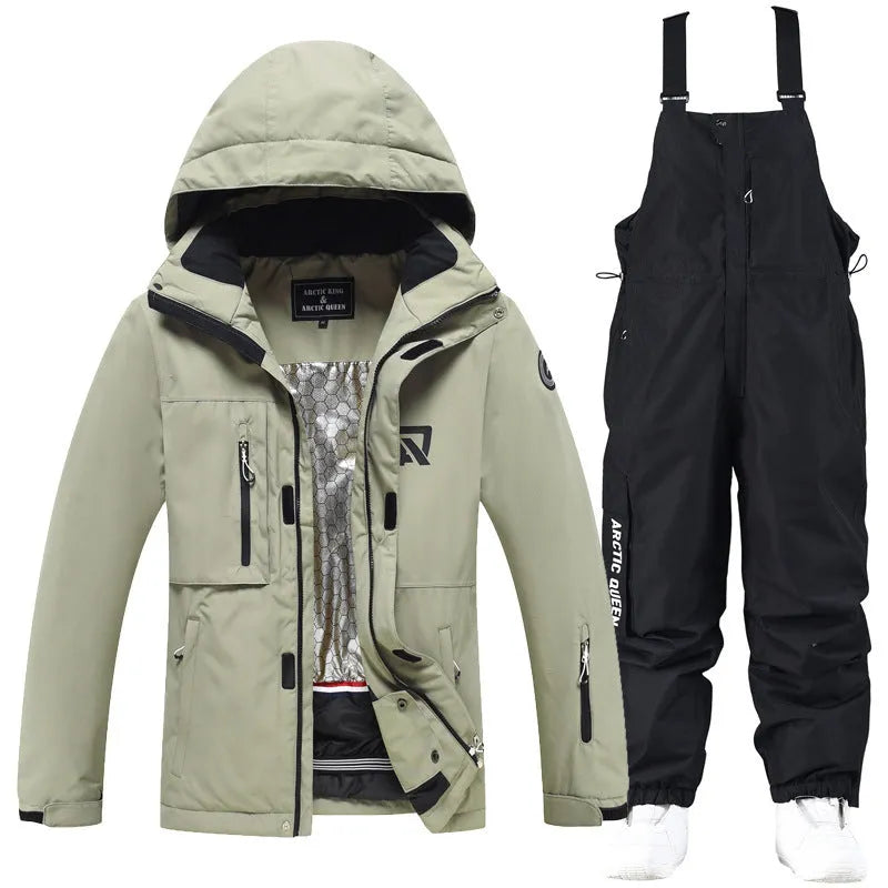 Blue and black unisex winter ski suit jacket and pants for snow sports.