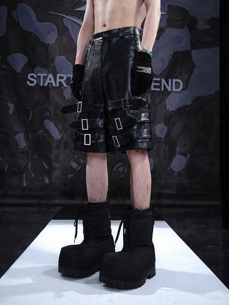 Men's black PU leather cropped shorts with medium-low waist design and leather ring detailing