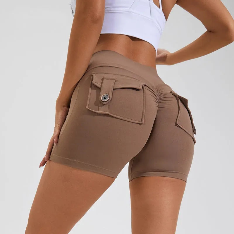 Women's high waist hip lifting shorts with pockets in various colours for fitness activities