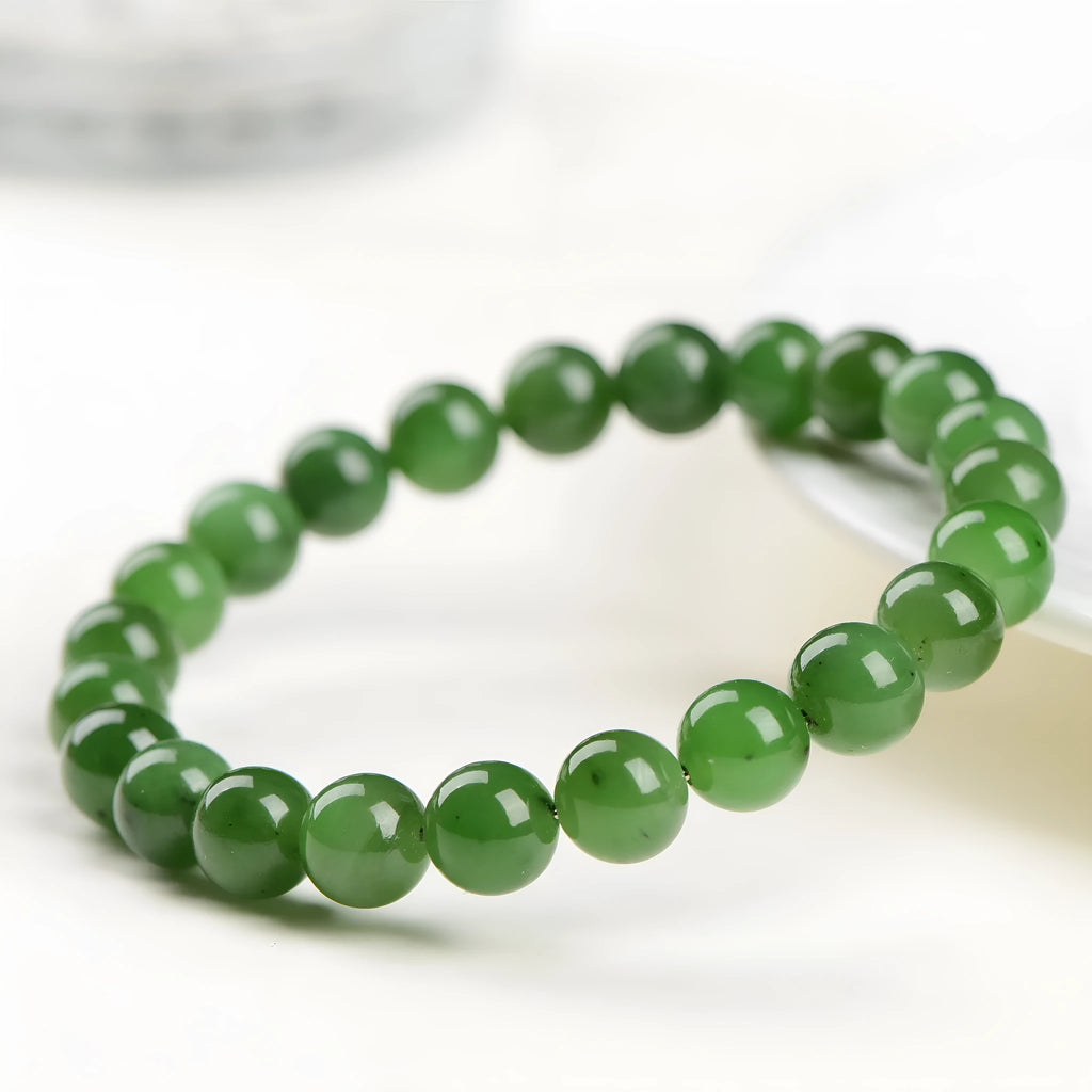 Natural Jasper Hetian jade bead bracelet in various sizes on a white background.
