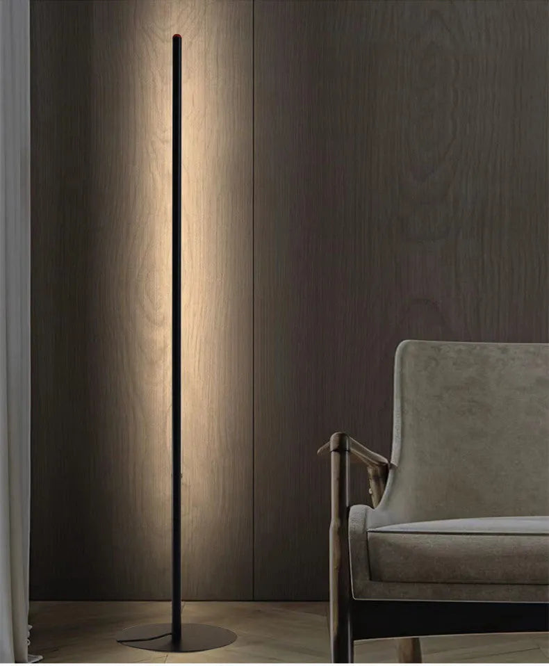 Tall, slim aluminium alloy vertical floor lamp with a LED light source on a modern stand.