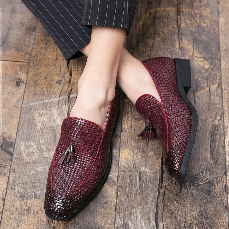 Men's black pointed toe slip-on business shoes with tassel detail on artificial PU upper