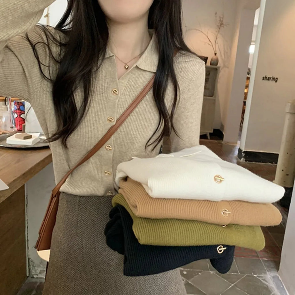 Beige viscose knitted long-sleeved cardigan with loose fit design on hanger