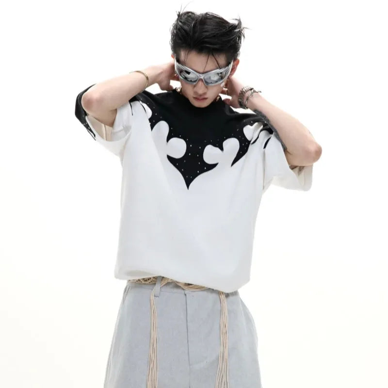 Men's grey cotton T-shirt with a textured burnt flower design and rhinestone details on the front.