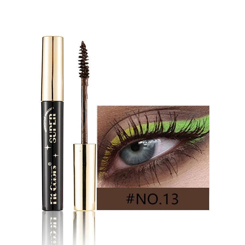 Colourful waterproof mascara tube displaying vibrant shades like wine red, gold, and mermaid green for stage and event makeup.