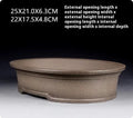 Handmade antique oval purple sand ceramic bonsai pot measuring 25cm long by 21cm wide by 6.3cm high