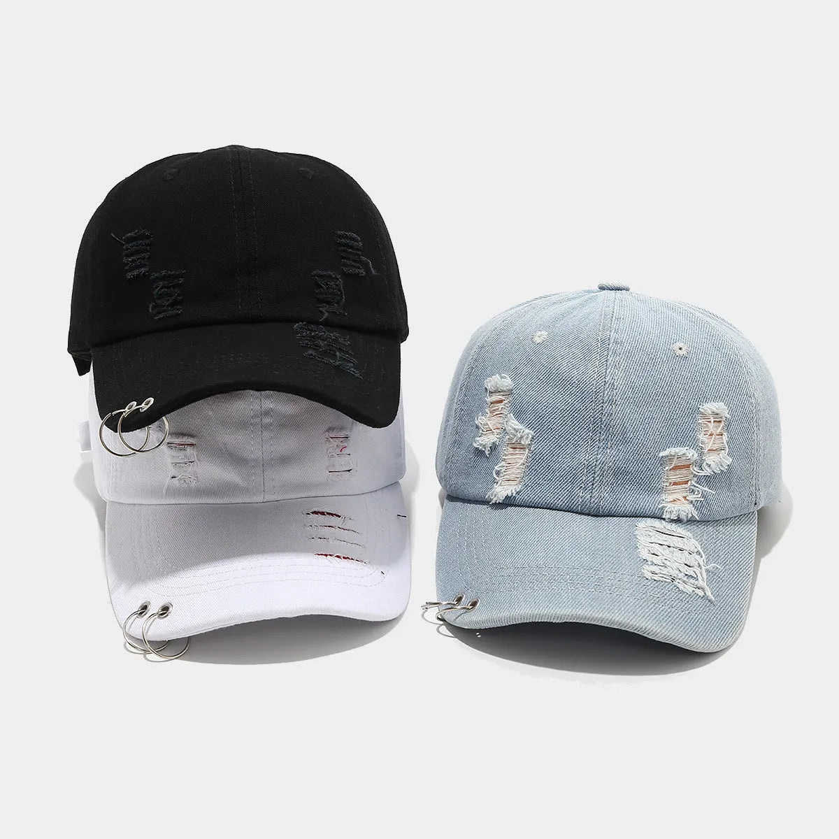 Men's adjustable black cotton denim baseball cap with a dome crown, shown on a grey background.