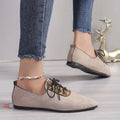 Beige leopard print women's pointed toe pumps with a faux PU upper and rubber sole.