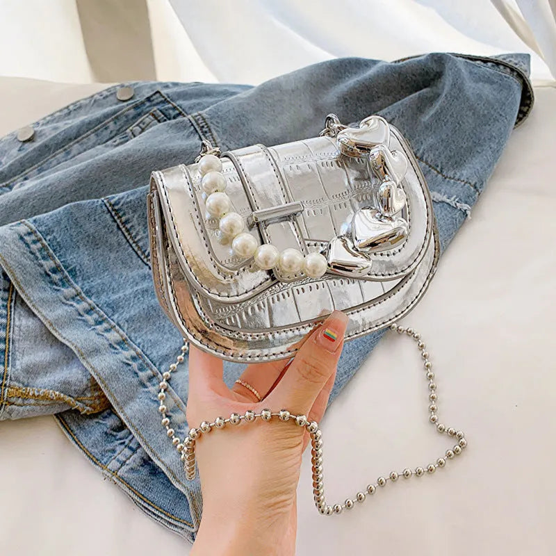 Women's silver PU mini tote saddle crossbody bag with single strap and phone compartment