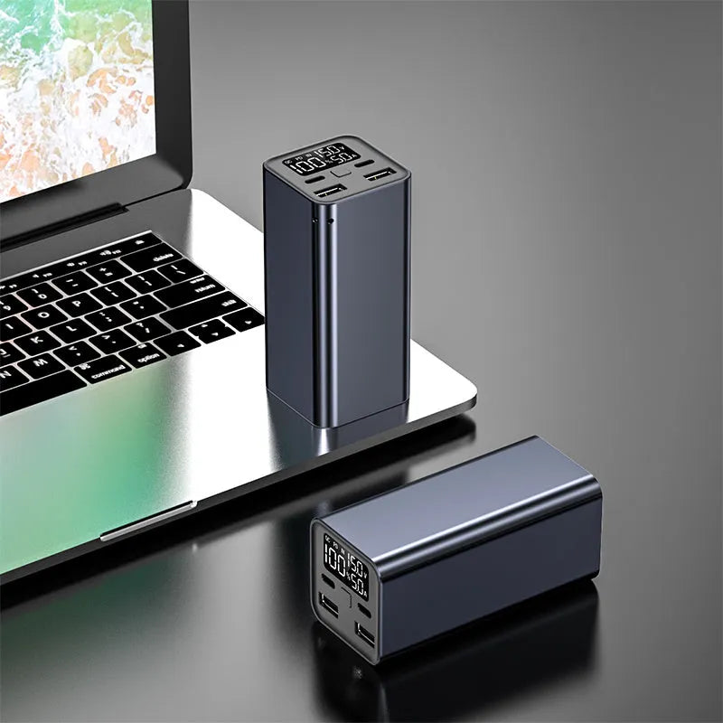 65W laptop charging bank with 20000mAh battery in metal casing showing black, blue and grey colour options