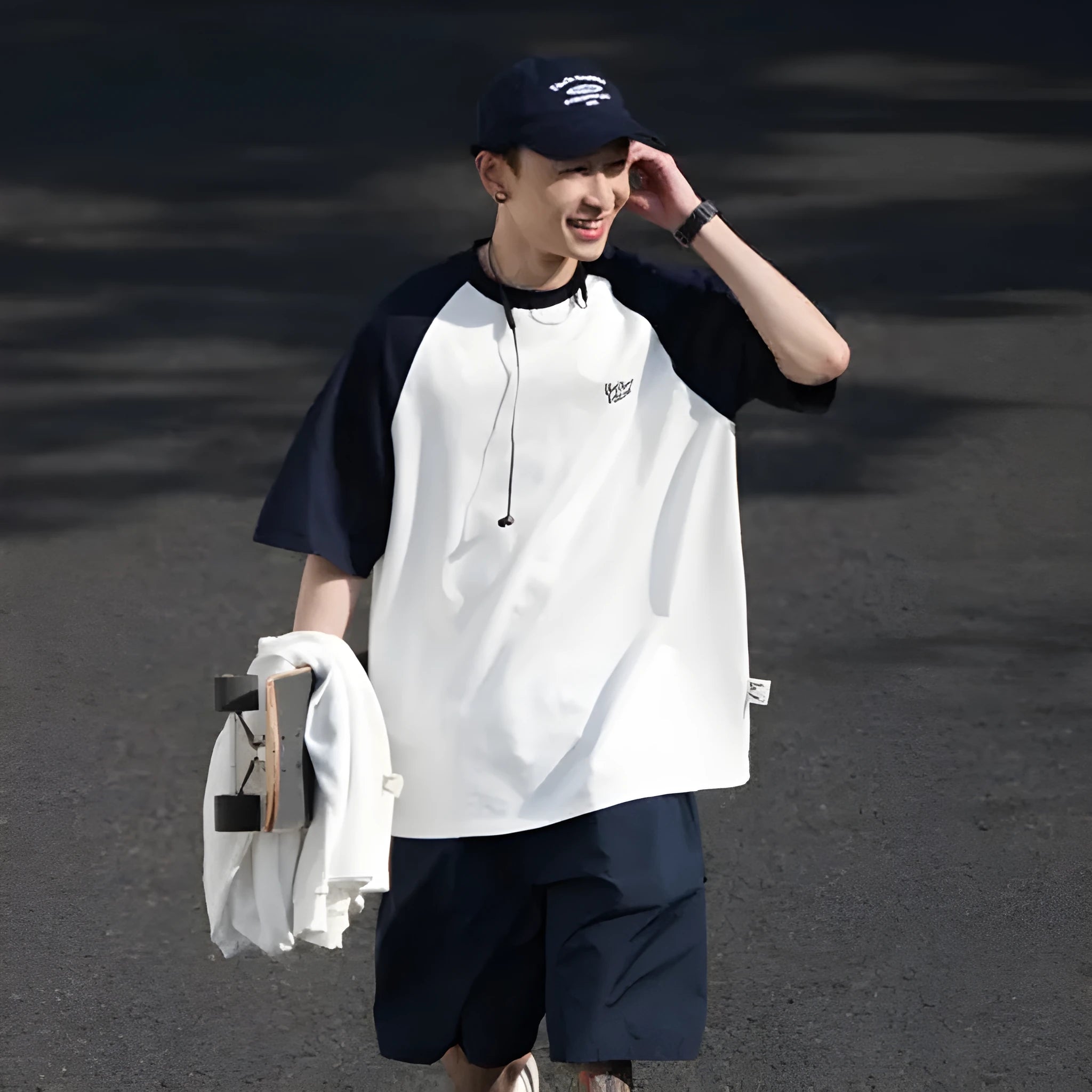 Japanese-style raglan sleeve t-shirt in blue, green, and grey colours with loose fit design