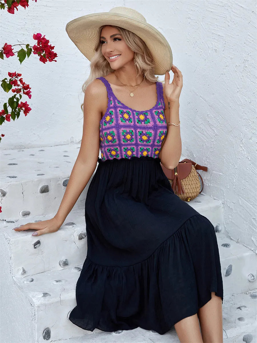 Purple sleeveless dress with floral embroidery, shown on a hanger