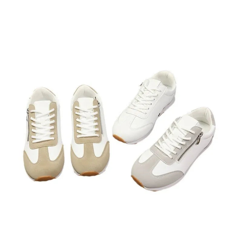 Women's flat-heeled shoes in Champagne, grey, and white with a PU upper and rubber sole.