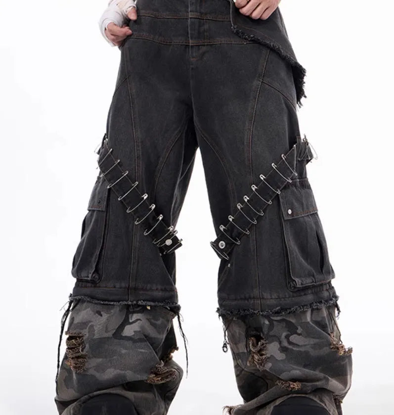 Grey camouflage men's jeans with panel splicing construction and ribbon detailing.