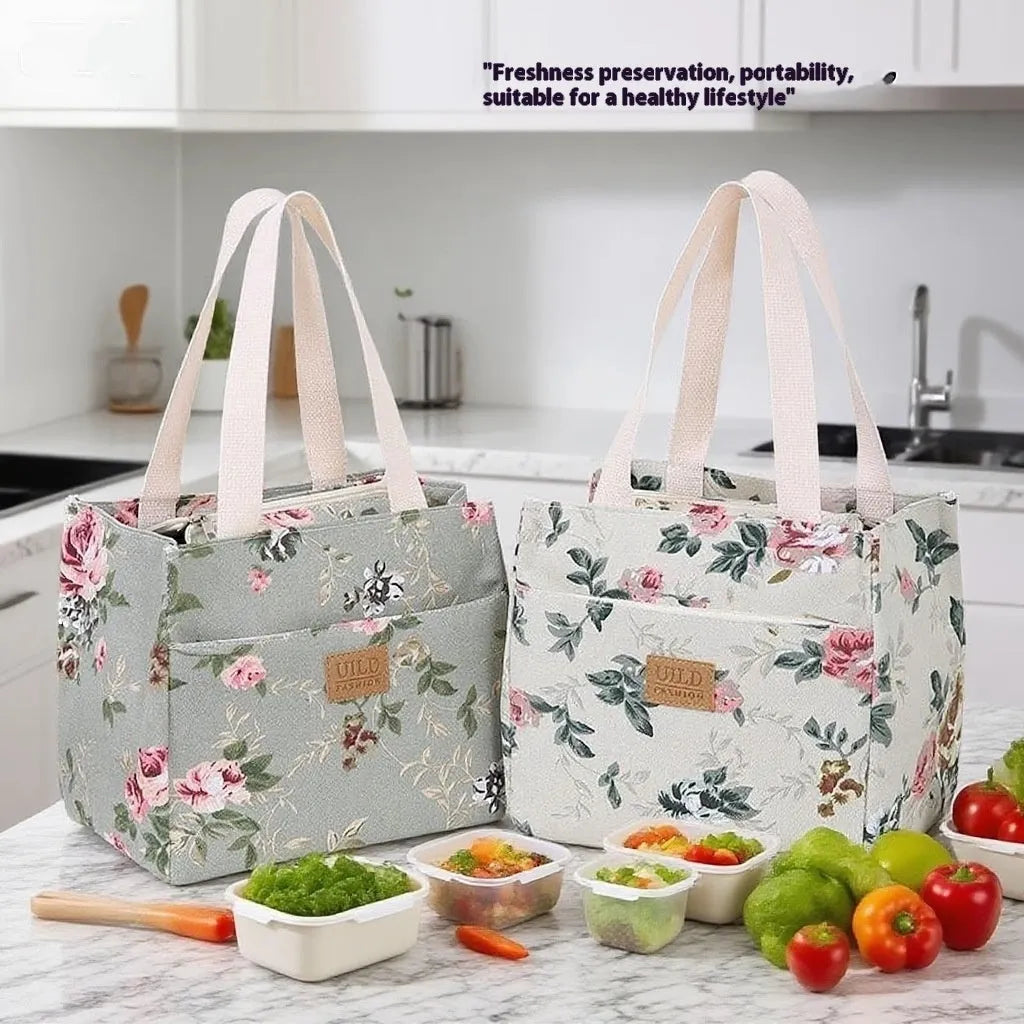 Women's printed canvas handbag with aluminium frame in horizontal square shape