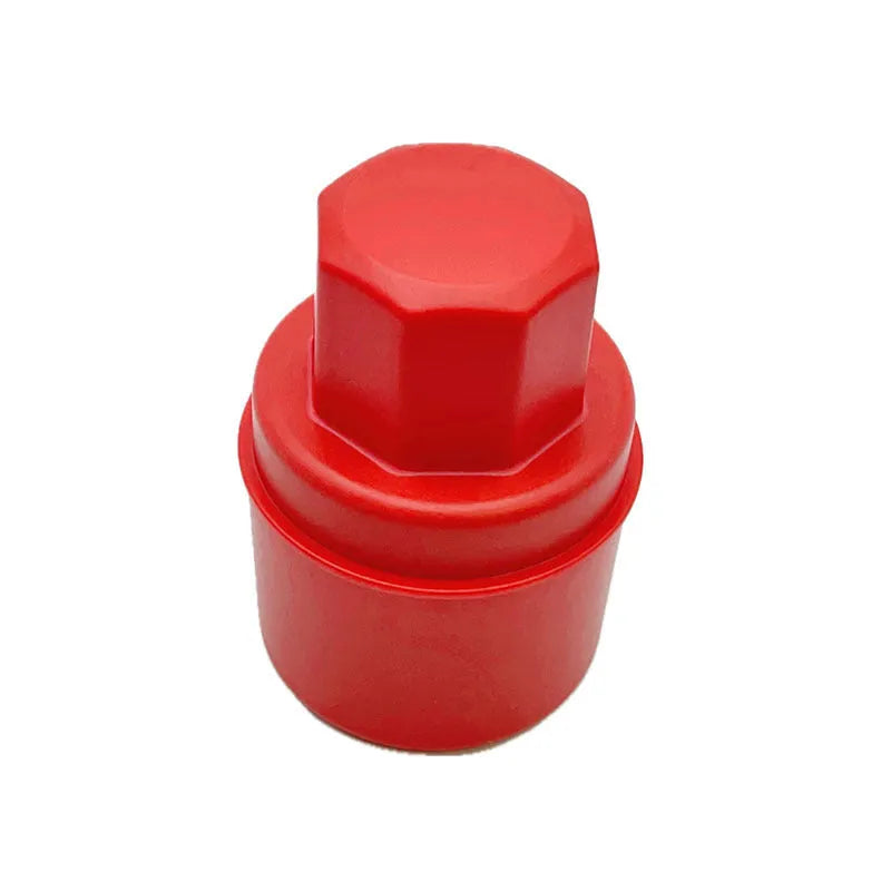 Black and red tire polishing sponge brushes with PP handles and lids on a garage workbench.