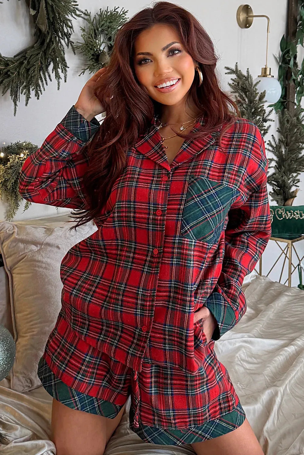 Red plaid Christmas pyjama set with contrast patches, includes long sleeve shirt and shorts