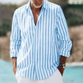 Man wearing a loose-fit short sleeve plaid shirt with a lapel collar, shown in a solid colour.