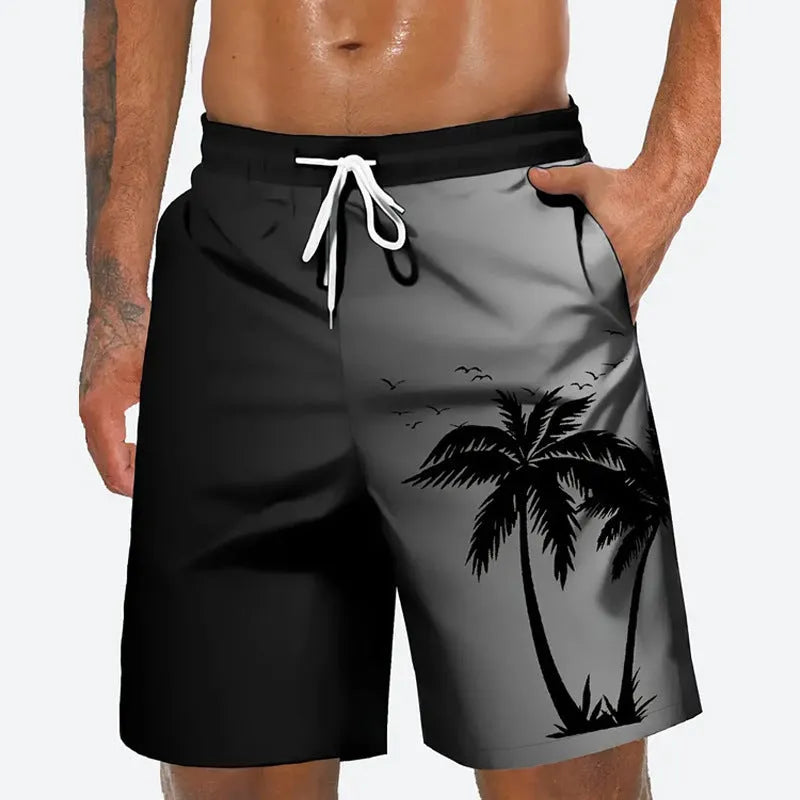 Man wearing loose light blue beach pants on shore, showing relaxed fit and casual style.