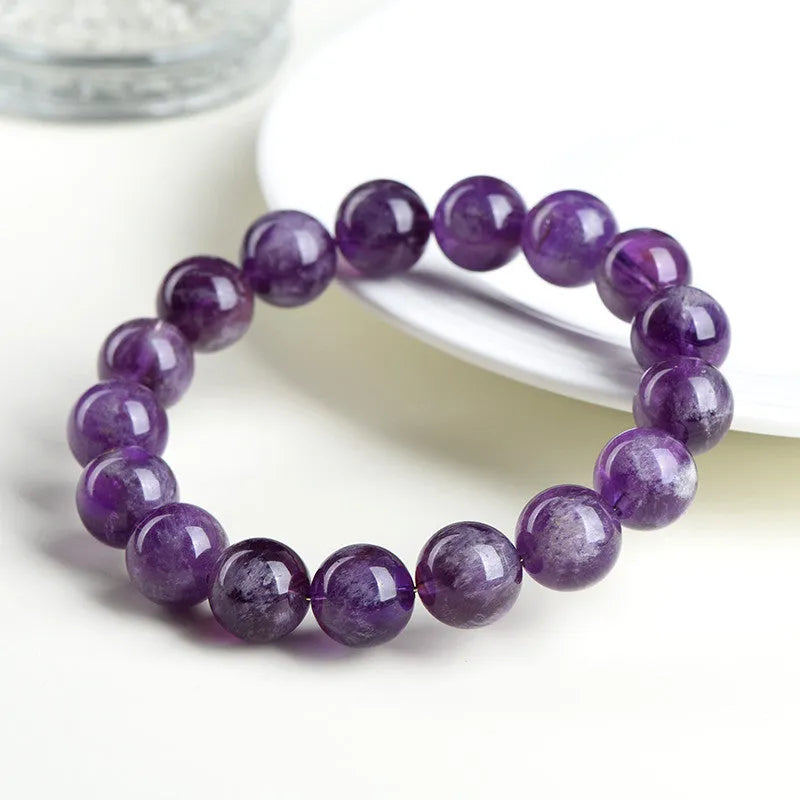 Natural snow mountain purple feather amethyst crystal bracelet with scattered geometry beads and Ruyi design